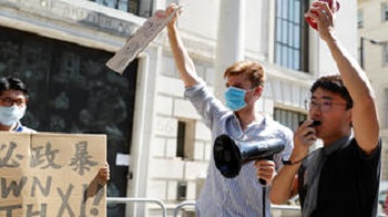 香港国安法波及美国公民，律师关尚义在大搜捕中被捕